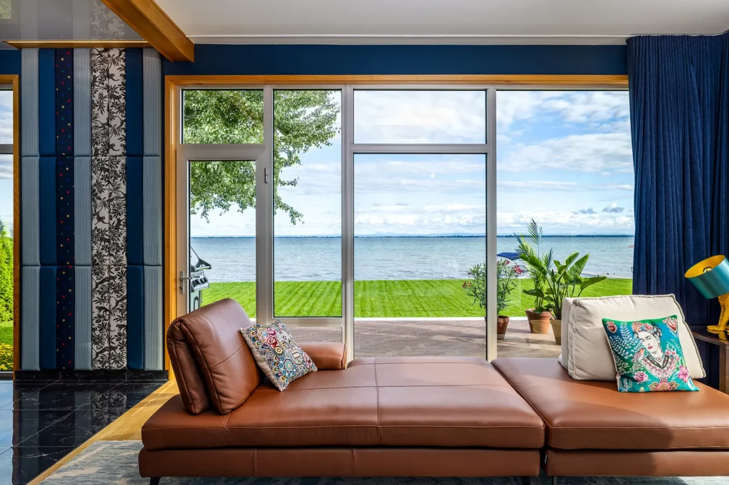 1615 Principale St-Zotique Quebec living room sofa view water windows modern design